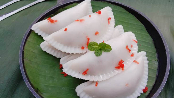 শীতে মজাদার তিলের পুলি পিঠা