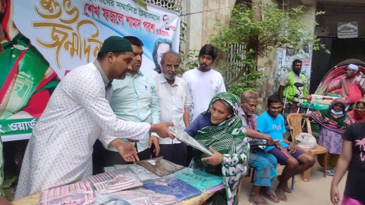 যুবলীগের দোয়া মাহফিল ও বস্ত্র বিতরণ