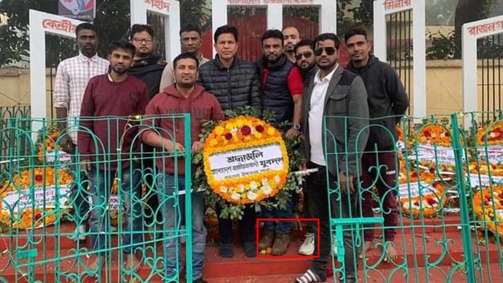 শহিদ বেদীতে জুতা পায়ে যুবদল নেতা!