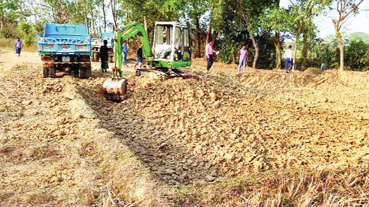 ফসলি জমি ধ্বংসের মহোৎসব