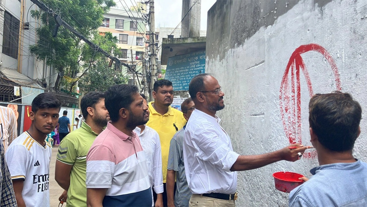 দেয়াল লিখন কর্মসূচির উদ্বোধন করলেন টুকু