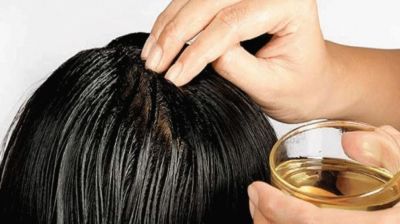যেসব উপায়ে তেল ব্যবহার করলে খুশকি কমবে