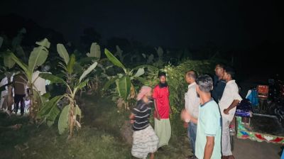 কলা বাগানে মিলল অর্ধপোড়া লাশ