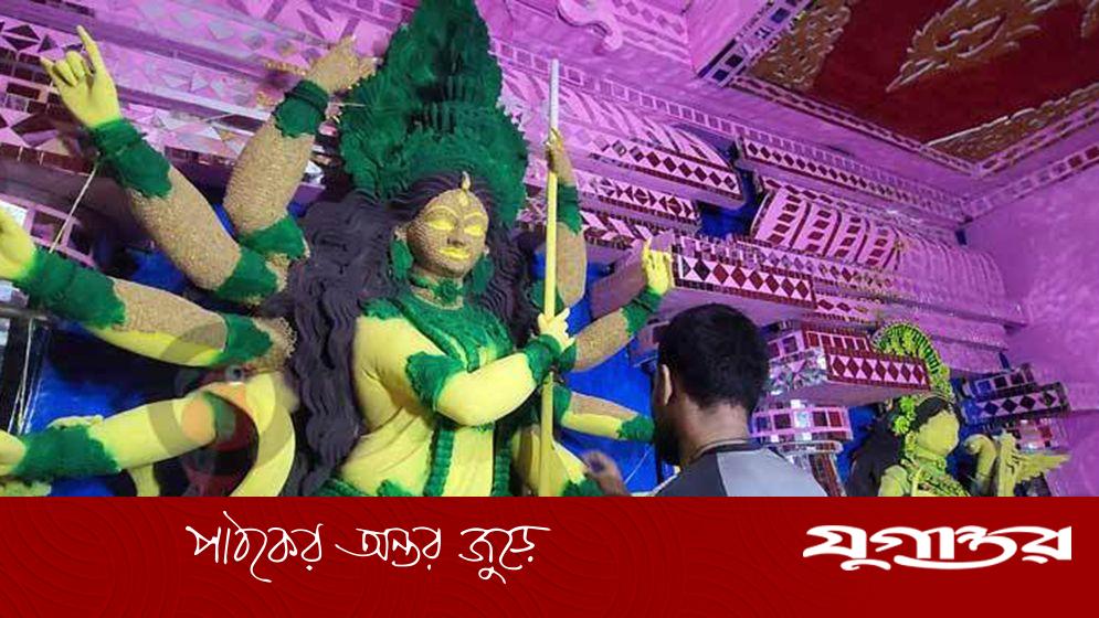 নজর কেড়েছে ধান দিয়ে তৈরি দুর্গা প্রতিমা