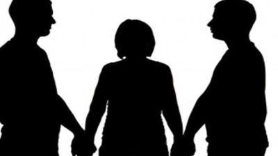 এক নারীর দুই স্বামী নিয়ে তোলপাড়