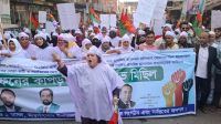 কাফনের কাপড় পরে বিএনপির প্রার্থী পরিবর্তনের দাবি