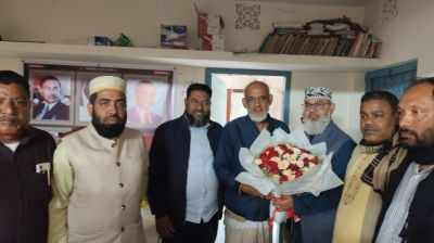 বিএনপি প্রার্থীর বাসায় ফুল নিয়ে গেলেন বিজয়ী মাসুদ সাঈদী