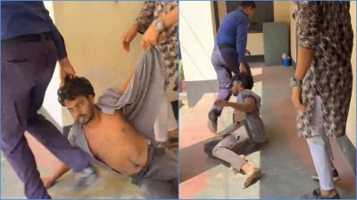 থানায় হামলার অভিযোগ, যুবকের চুল ধরে টেনে নিয়ে গেল পুলিশ