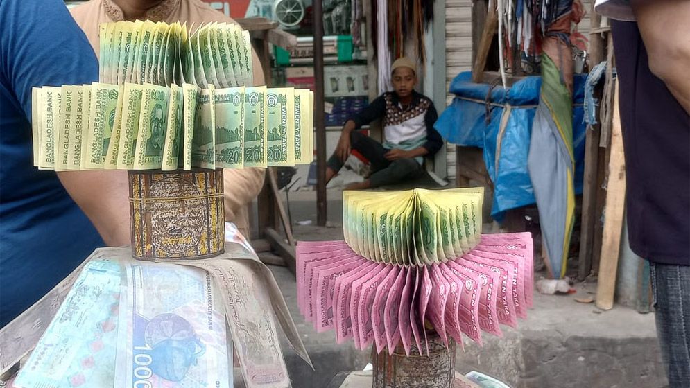 বেশি দামে নতুন টাকা বেচাকেনা কি জায়েজ?