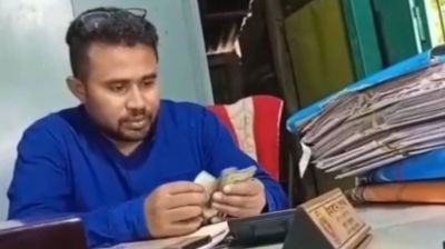 ঘুসের ভিডিও ভাইরাল, যে সাজা পেলেন সেই ভূমি কর্মকর্তা