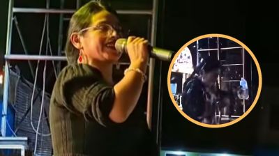 মঞ্চে গান গাওয়া অবস্থায় তরুণীকে কাচের বোতল নিক্ষেপ