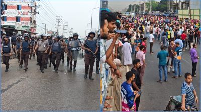 বেতন বৃদ্ধির দাবিতে মহাসড়কে শ্রমিকদের অবস্থান, পুলিশের টিয়ারশেল নিক্ষেপ